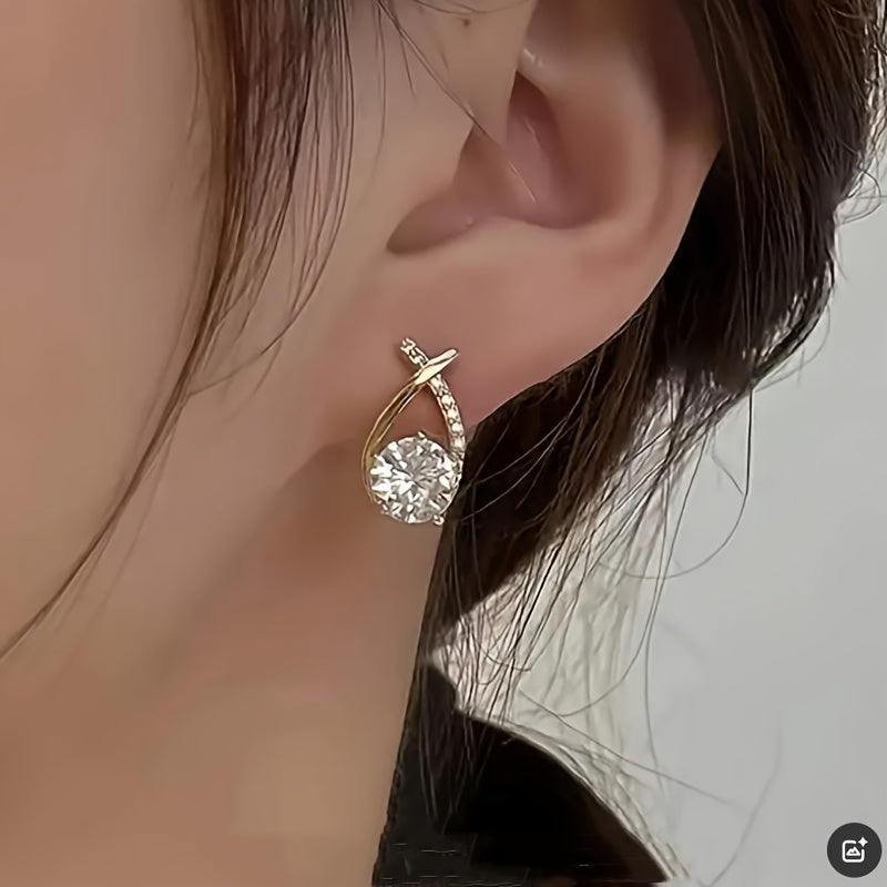 Ohrringe mit goldenem Kreuz und Zirkonia