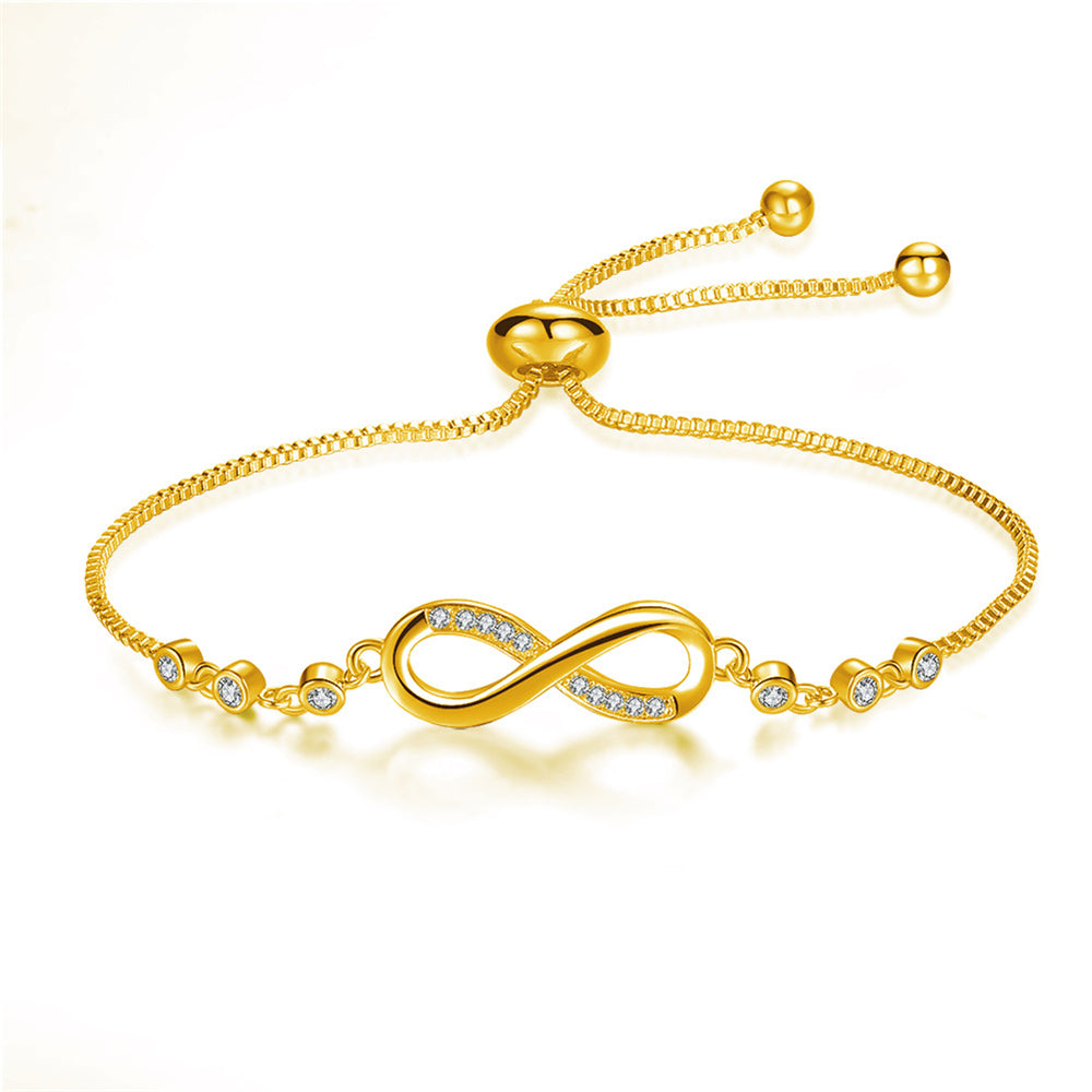 Joli bracelet réglable en or rose en forme de symbole de l'infini