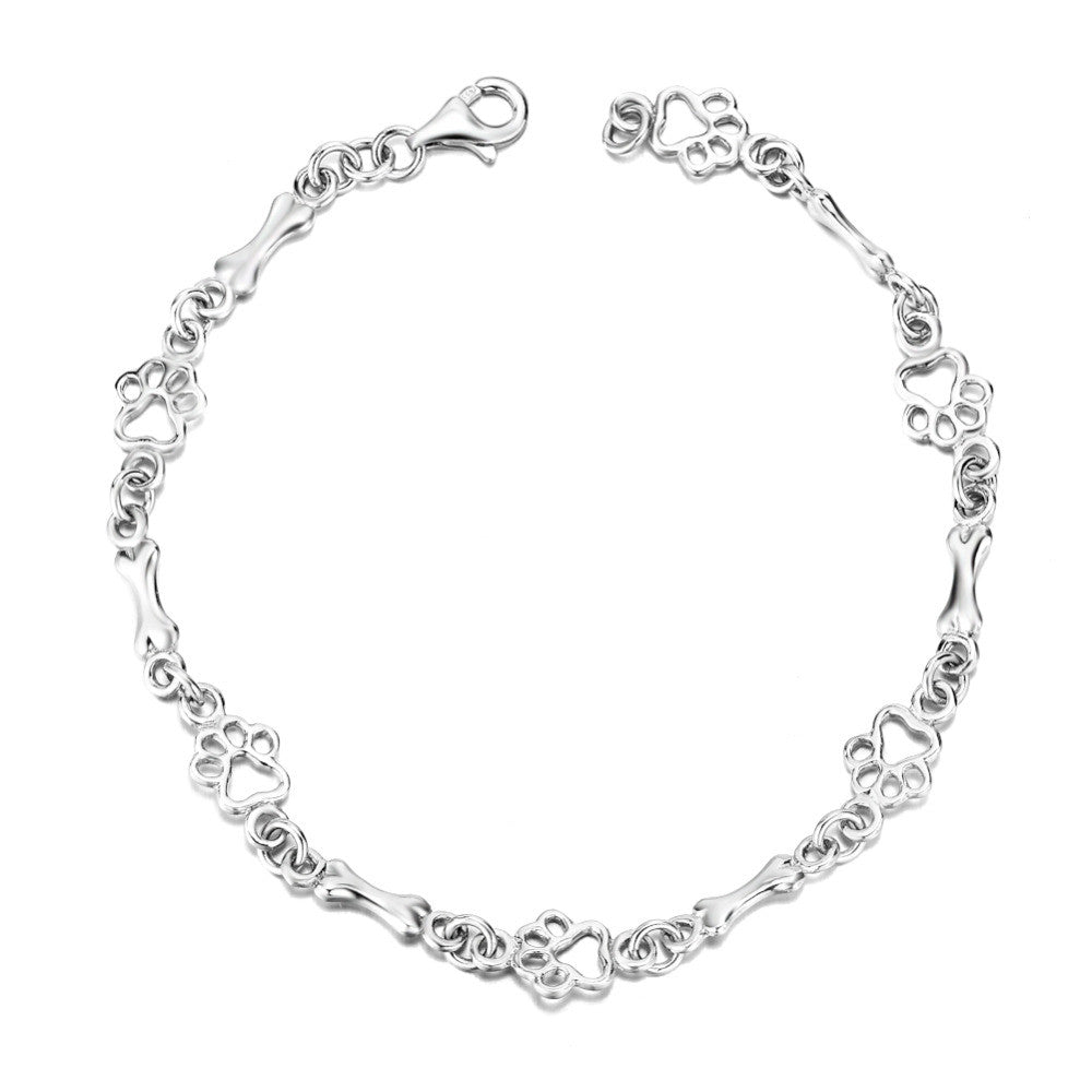 Hundepfote und Knochen Armband in reinem Silber