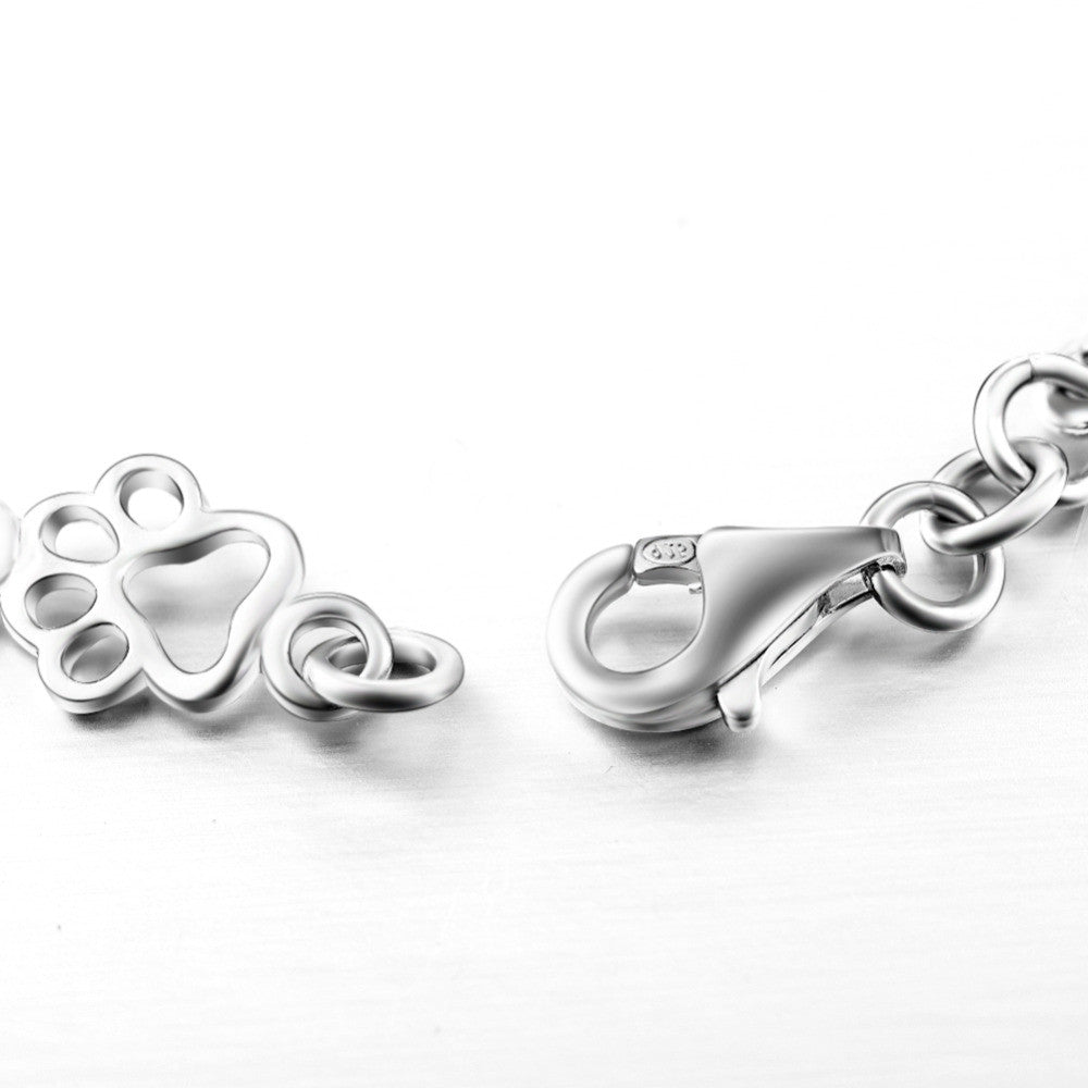 Hundepfote und Knochen Armband in reinem Silber