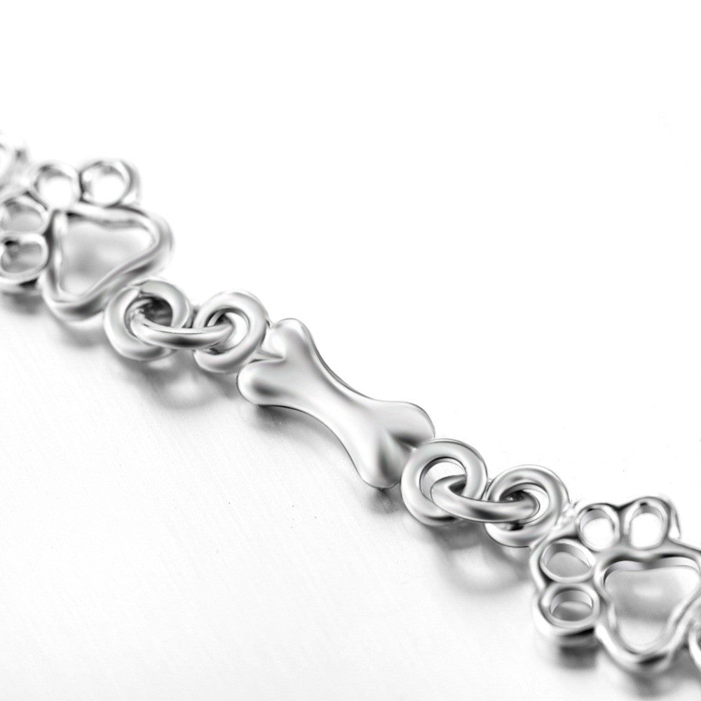Hundepfote und Knochen Armband in reinem Silber