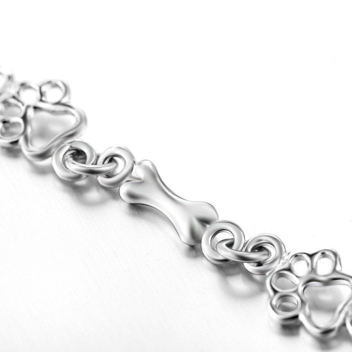 Hundepfote und Knochen Armband in reinem Silber