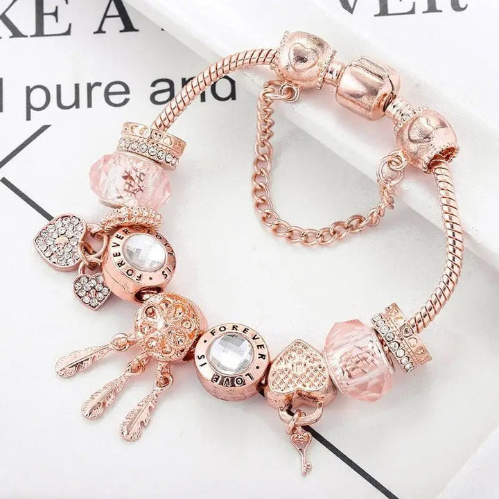 Rosa Traumfänger Armband mit Silbernen Charms