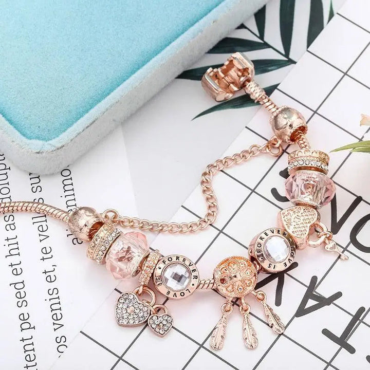 Rosa Traumfänger Armband mit Silbernen Charms