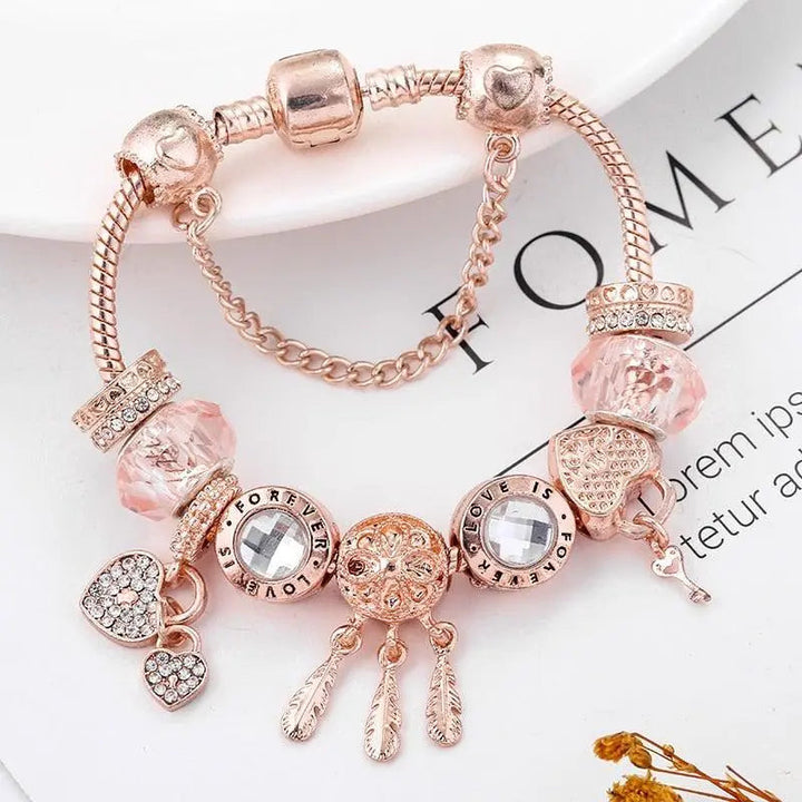 Rosa Traumfänger Armband mit Silbernen Charms