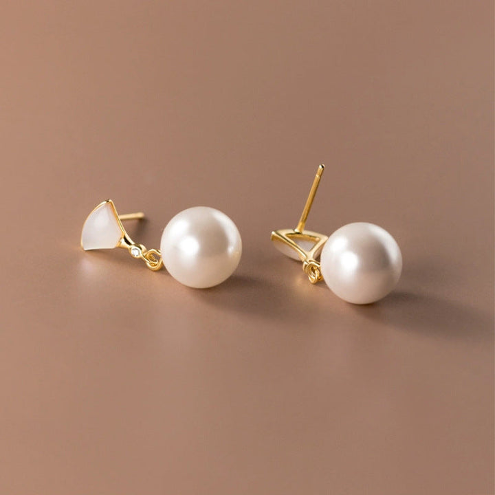 Boucles d'oreilles argentées chics avec perles