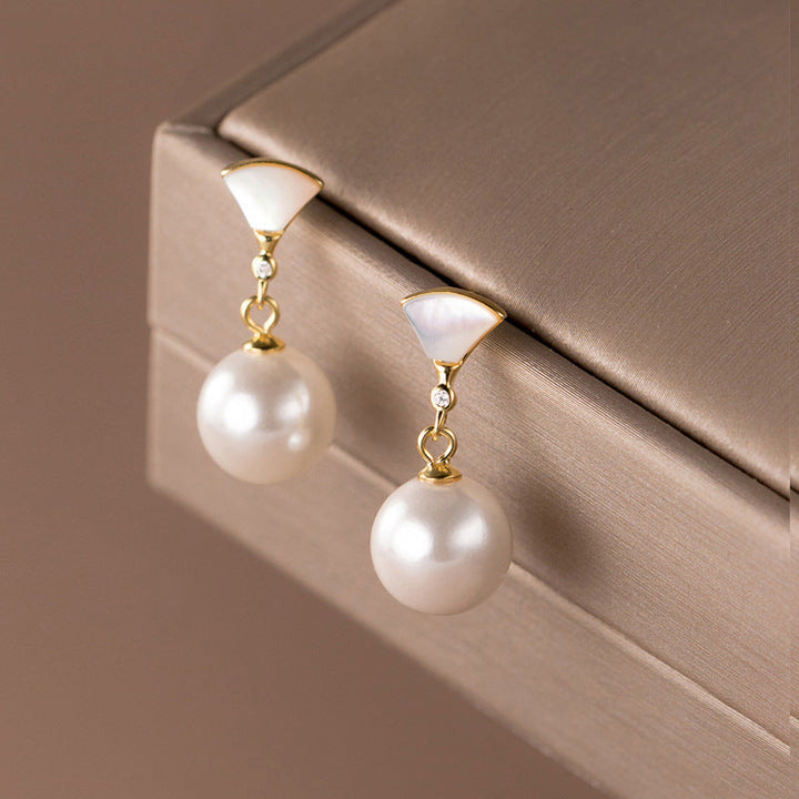 Boucles d'oreilles argentées chics avec perles