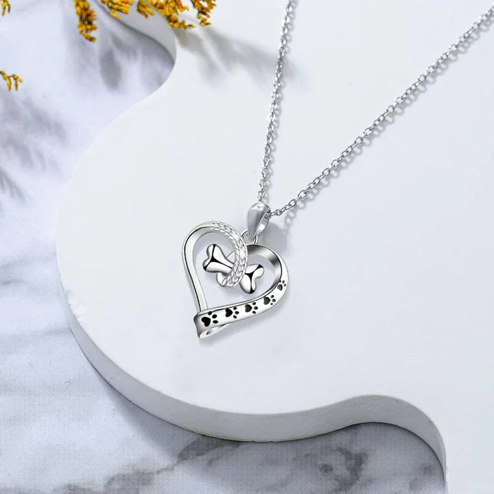 2-teiliges Schmuckset mit Pfoten, Herz und Knochen Anhängern