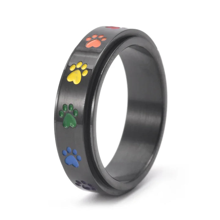 Drehender Stress-reduzierender Pfoten Ring in Edelstahl mit Regenbogenpfoten