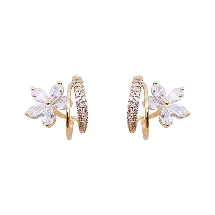 Blumenohrringe mit Zirkonia-Einlagen in Gold