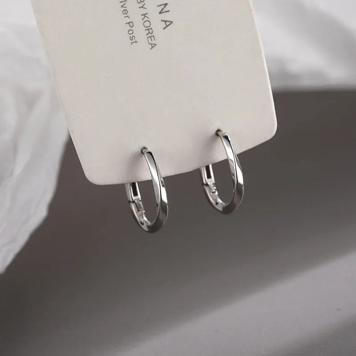 Boucles d'oreilles rondes en argent sterling incrustées