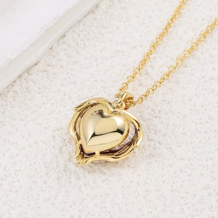 Collier cœur rubis Angel Embrace | Or