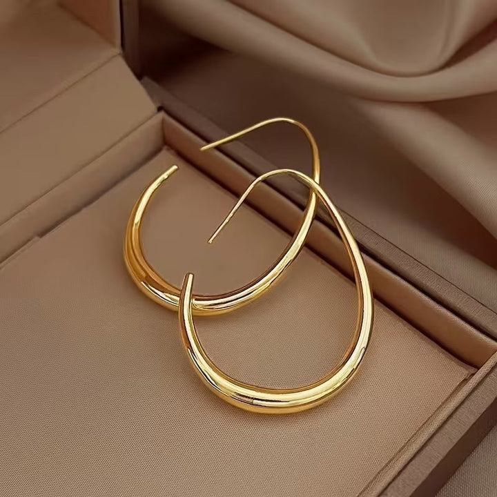 Élégantes boucles d'oreilles vintage en or