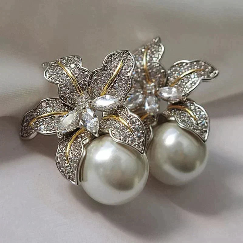 Élégantes boucles d'oreilles fleuries en perles